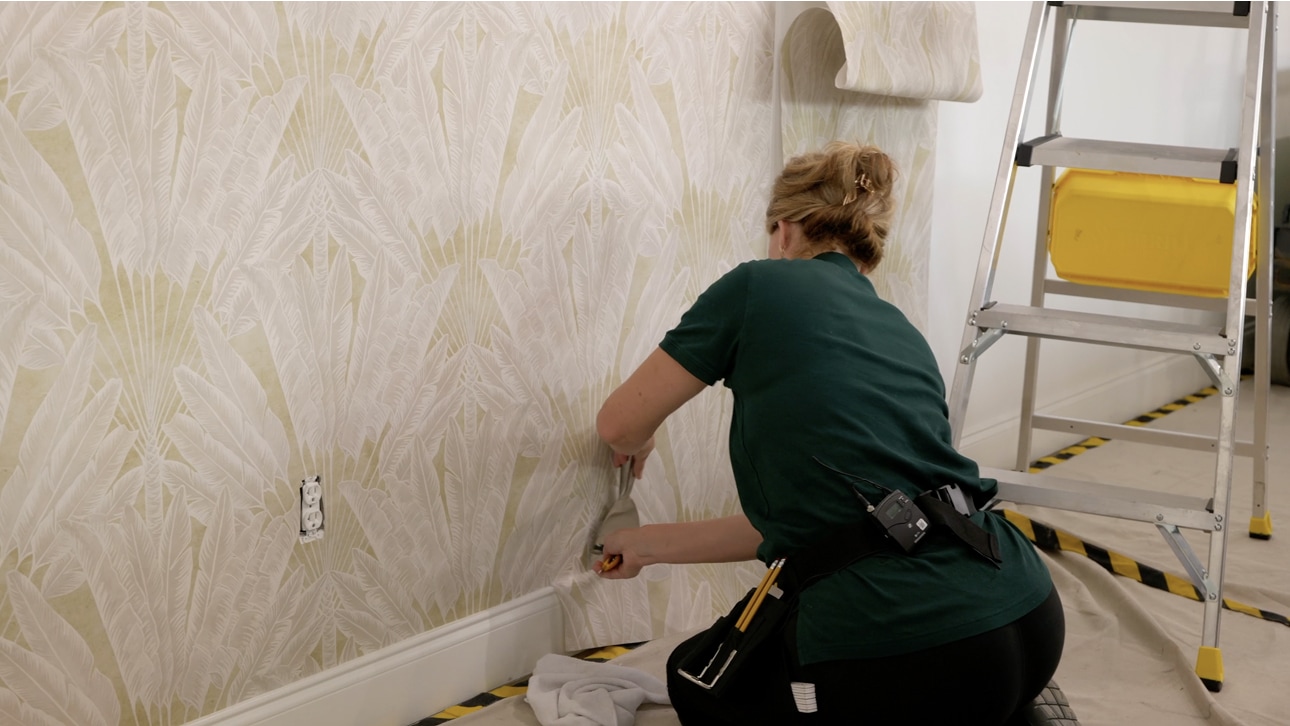 Finished bedroom with decorative wallpaper